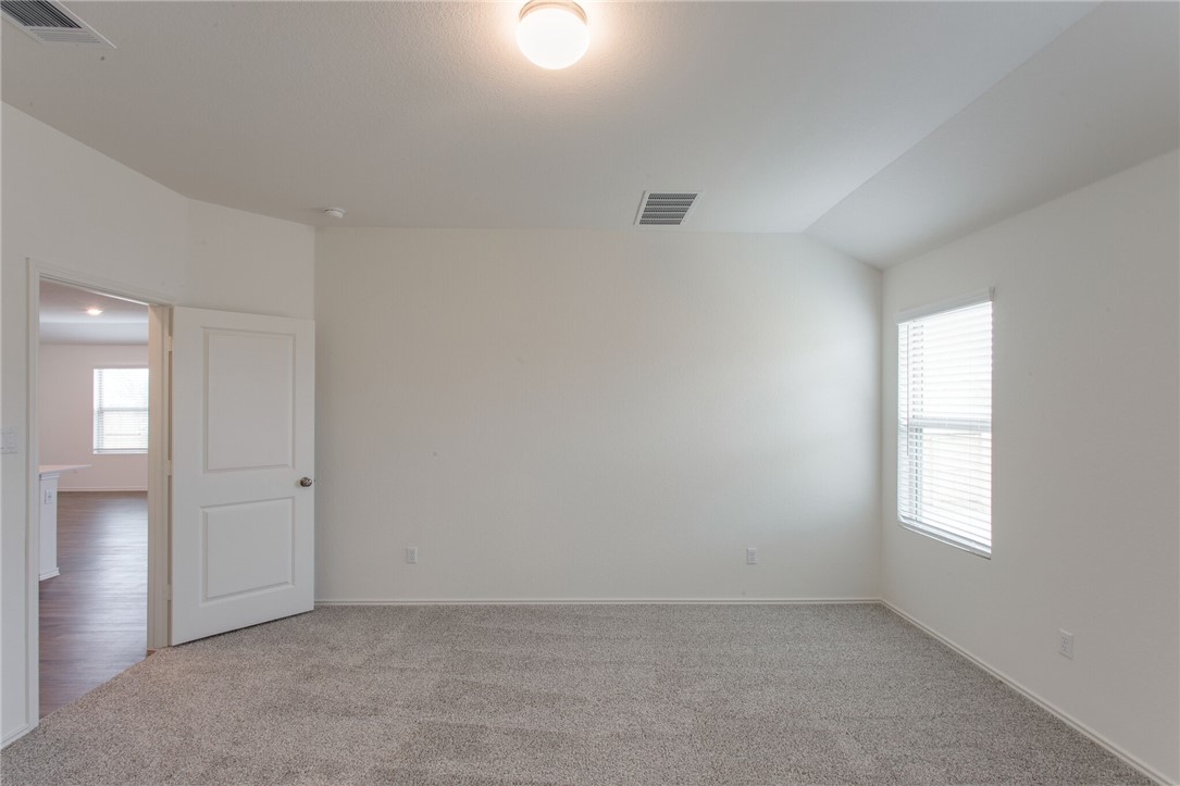 3417 Pauling Loop Round Rock, TX 78665 - Photo 17 of 31 an empty room with windows and closet