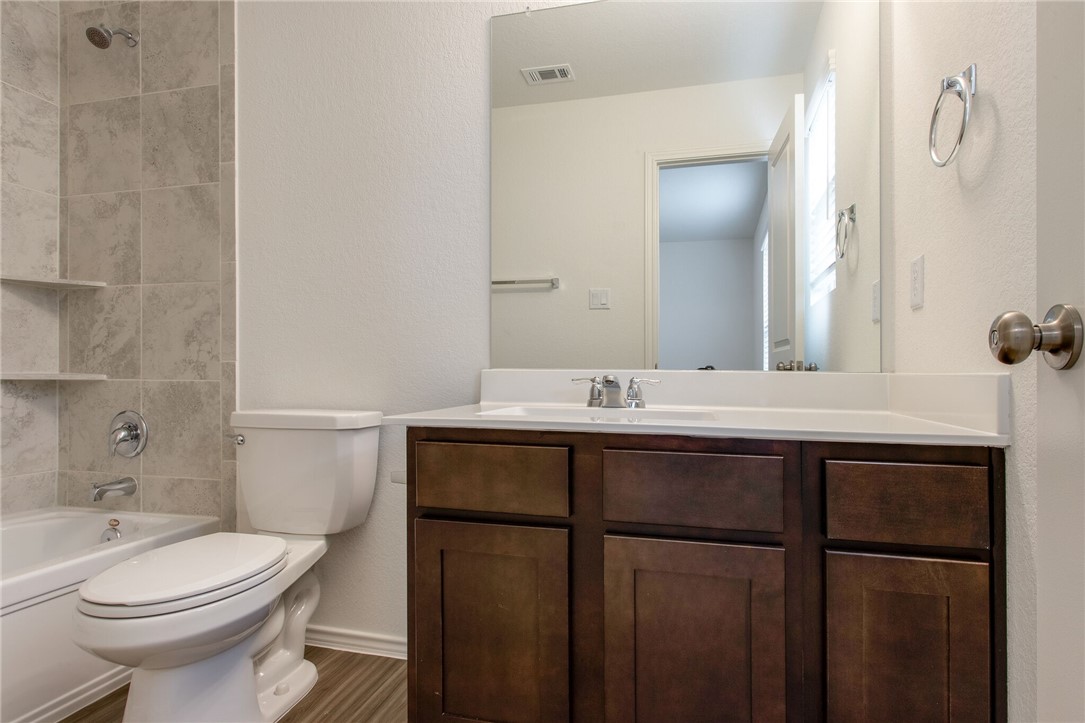 3417 Pauling Loop Round Rock, TX 78665 - Photo 25 of 31 a bathroom with a sink and a toilet