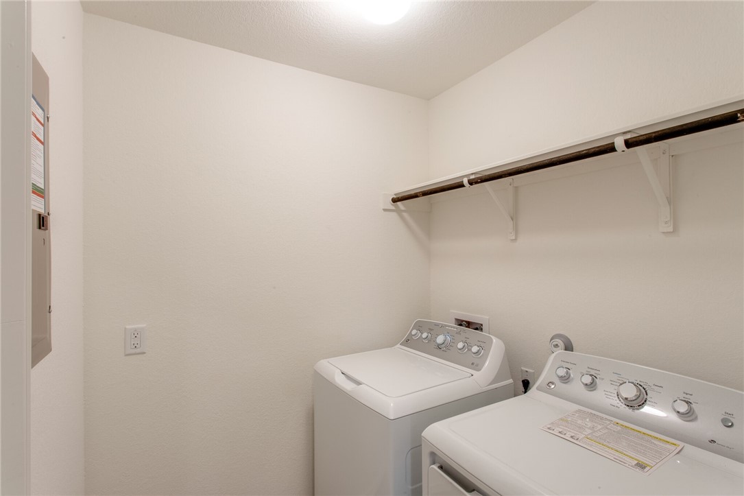 3417 Pauling Loop Round Rock, TX 78665 - Photo 26 of 31 a utility room with dryer and washer