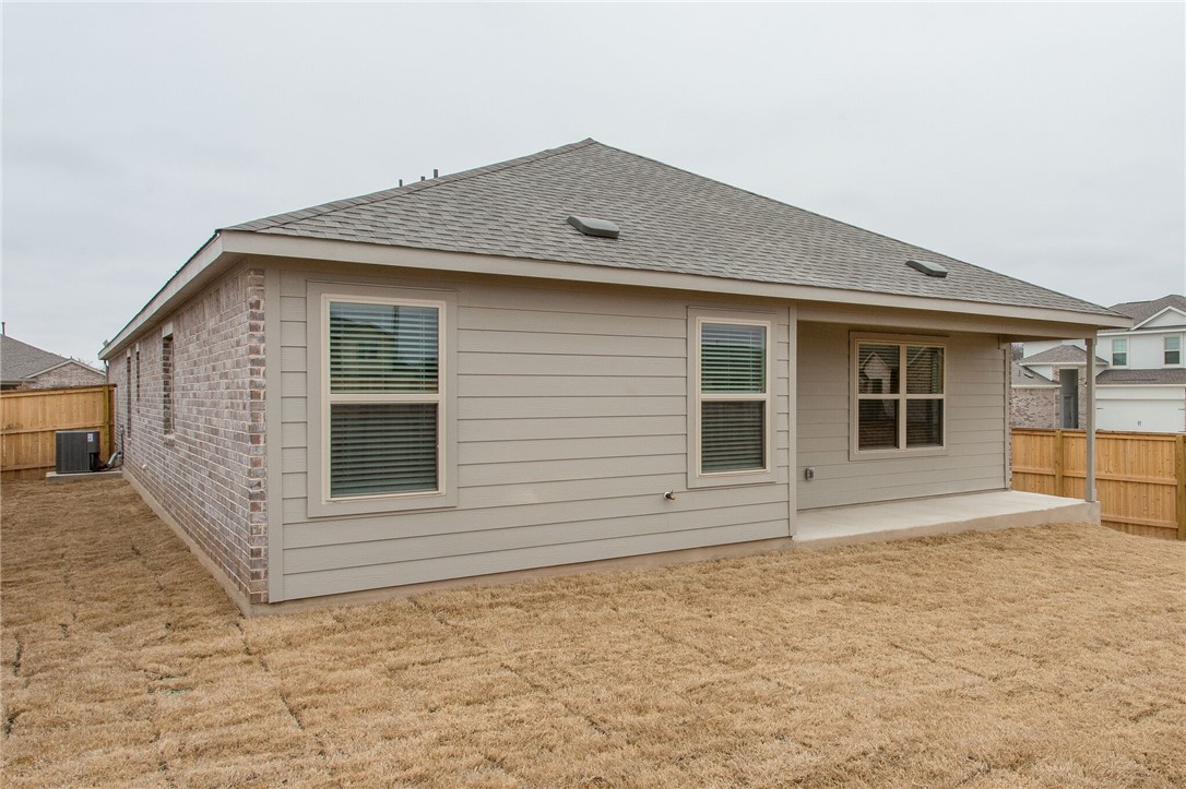 3417 Pauling Loop Round Rock, TX 78665 - Photo 30 of 31 a front view of a house with a yard