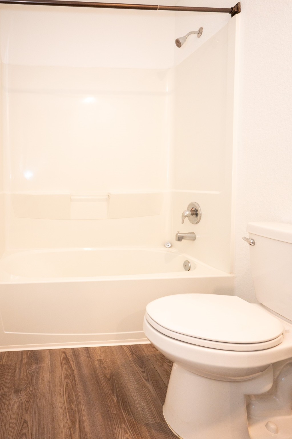 5403 Rosser Ruby Way Brookshire, TX 77423 - Photo 28 of 39 a bathroom with a toilet and a bathtub