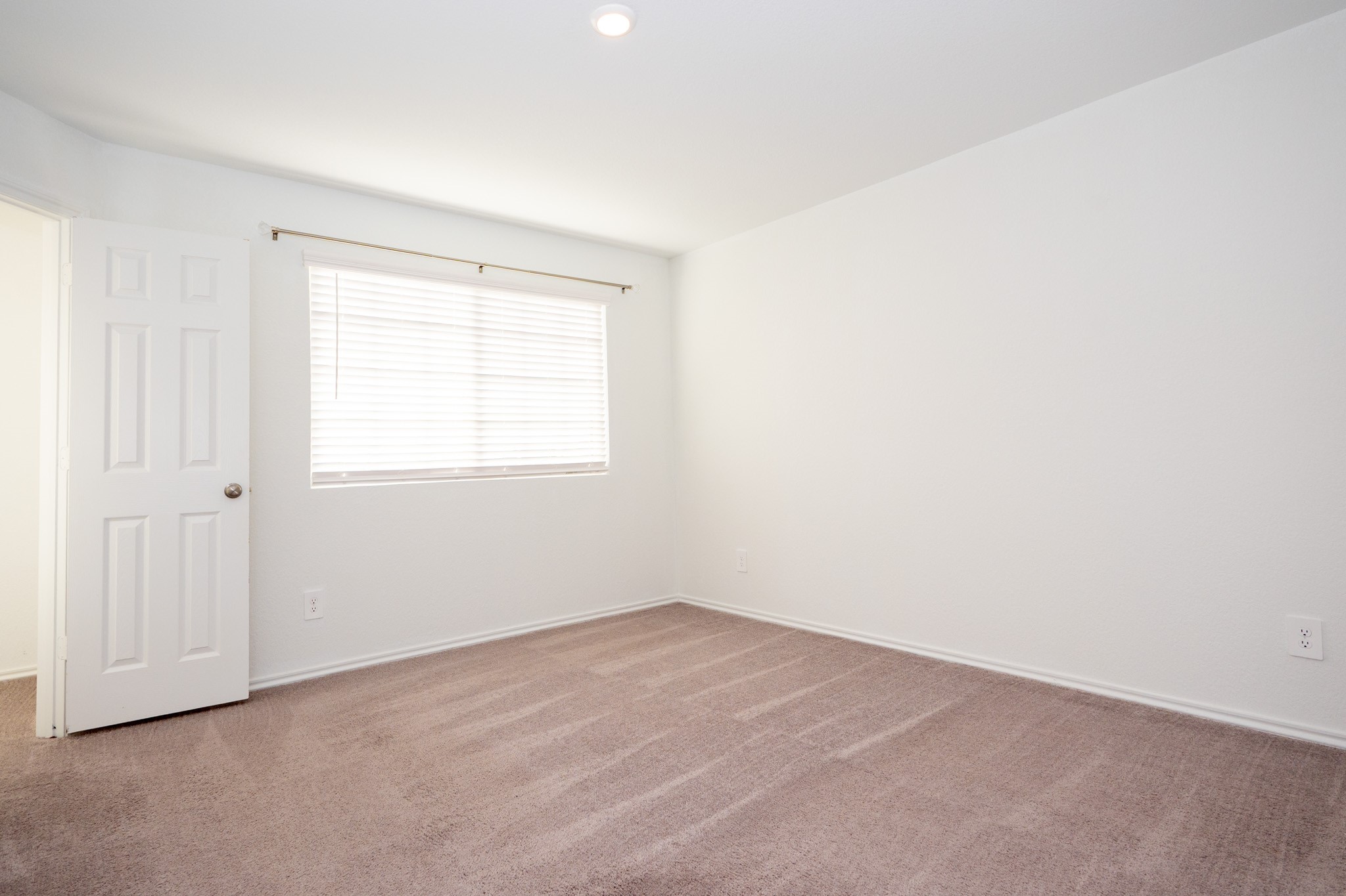 5403 Rosser Ruby Way Brookshire, TX 77423 - Photo 33 of 39 an empty room with a window