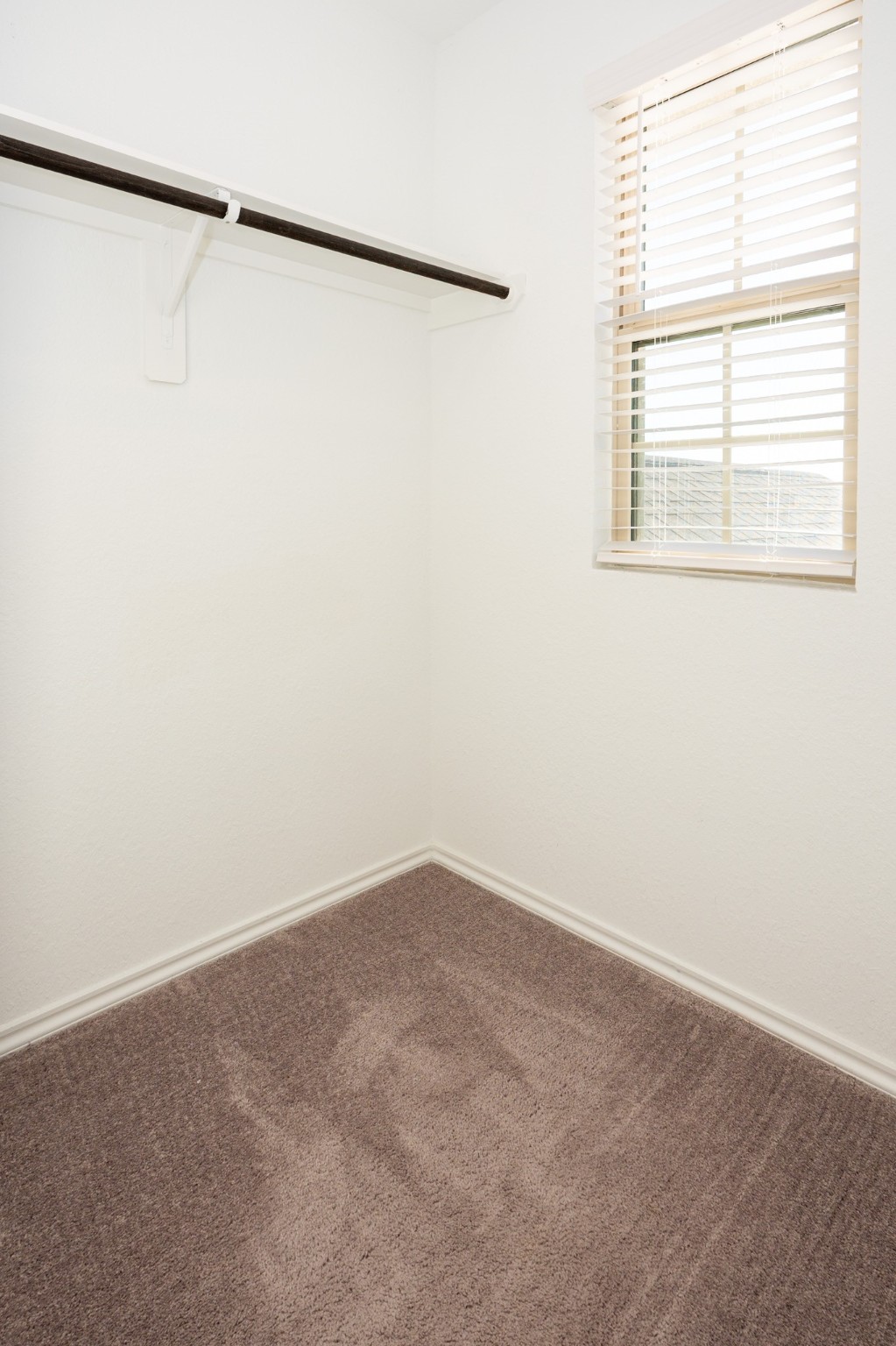 5403 Rosser Ruby Way Brookshire, TX 77423 - Photo 36 of 39 an empty room with a window