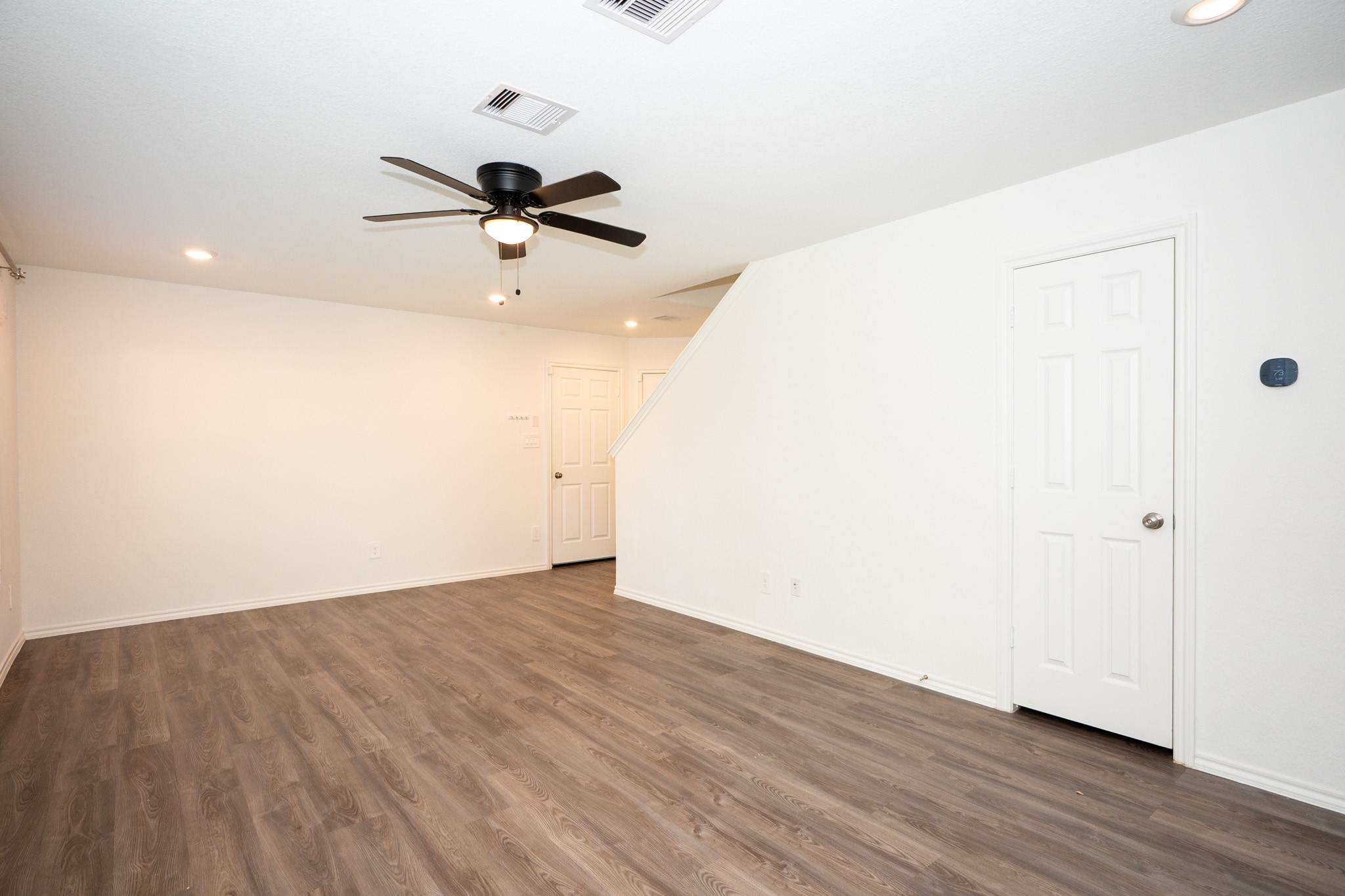 5403 Rosser Ruby Way Brookshire, TX 77423 - Photo 7 of 39 wooden floor in an empty room