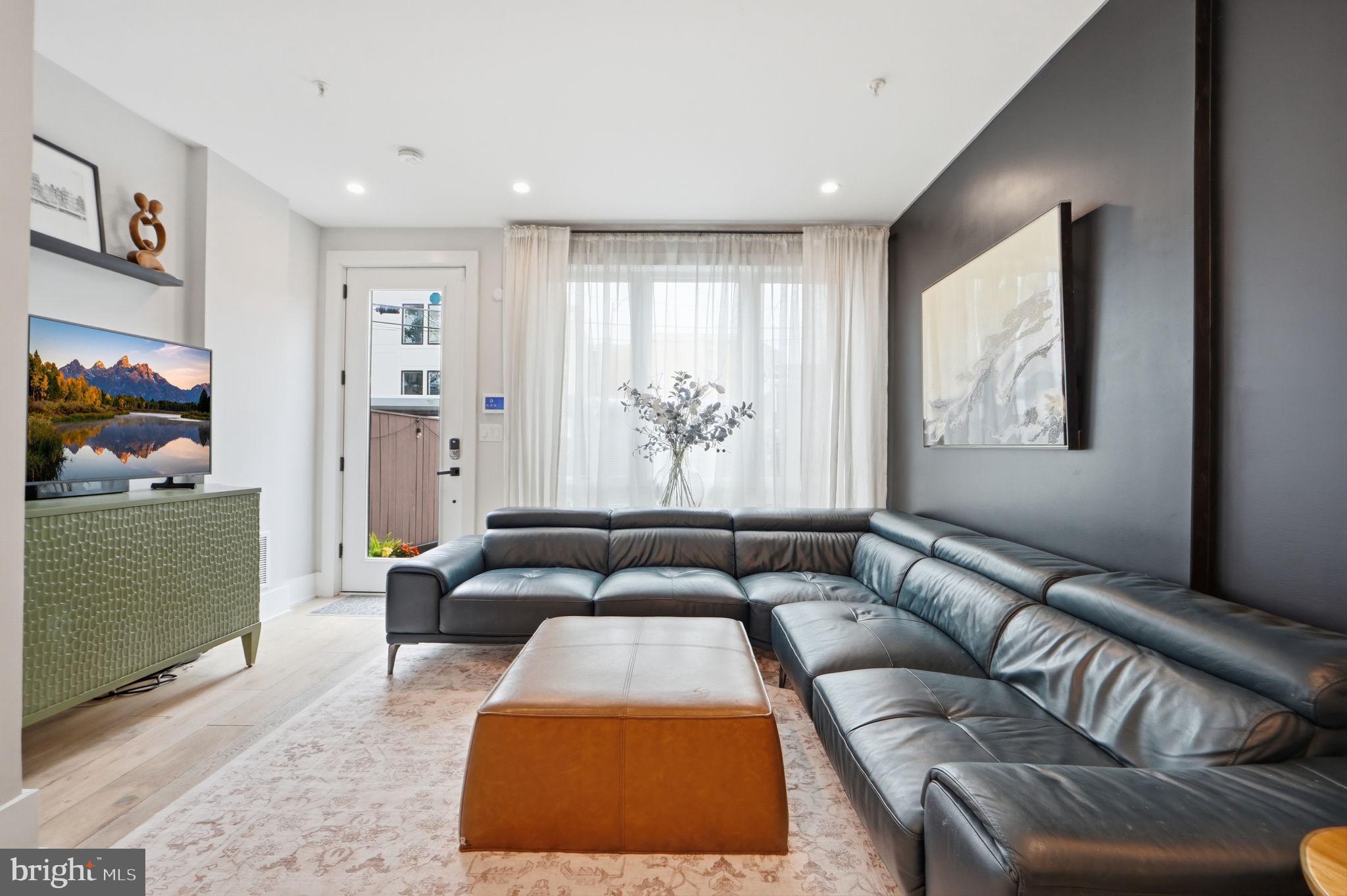 1216 I Street Northeast, Unit B Washington, DC 20002 - Photo 40 of 40 Light-filled living room and open floor plan