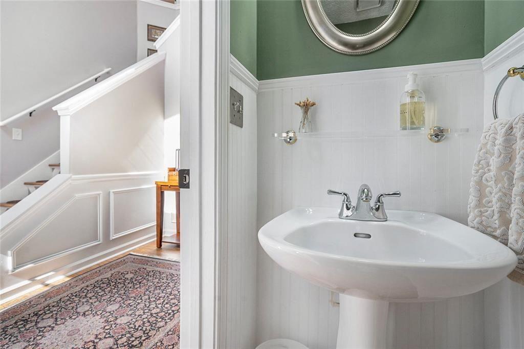 73 Whitlock Square Southwest Marietta, GA 30064 - Photo 12 of 35 a bathroom with a sink and a mirror