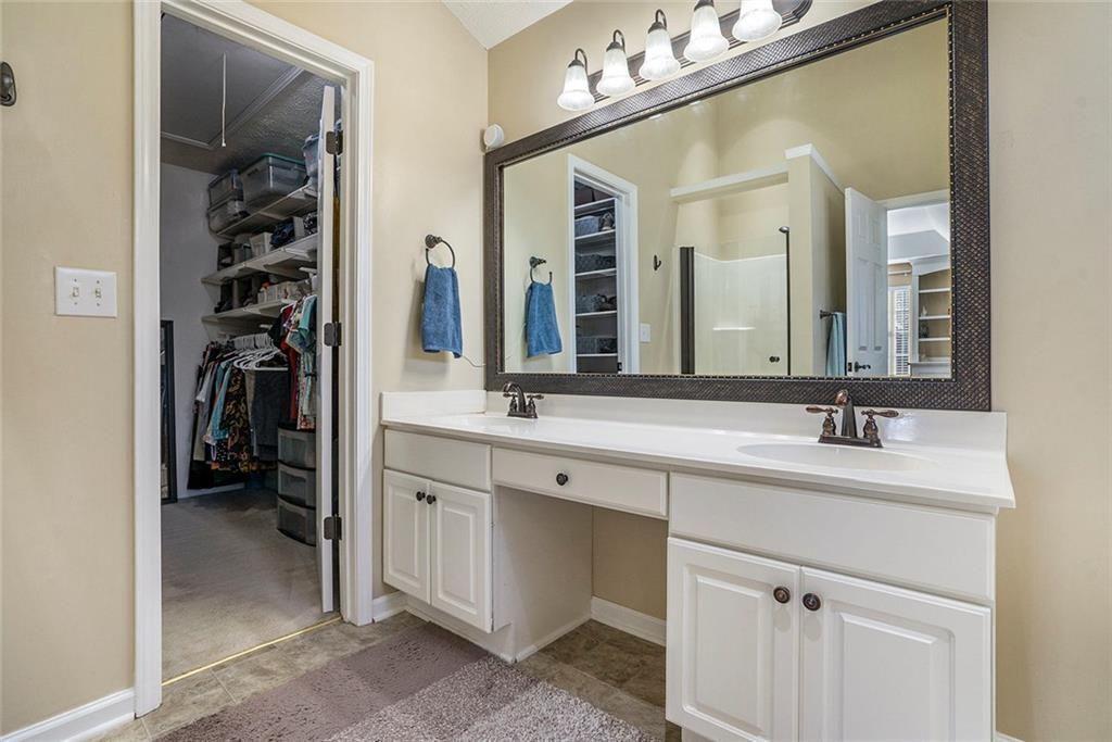 73 Whitlock Square Southwest Marietta, GA 30064 - Photo 17 of 35 a bathroom with a double vanity sink and a mirror