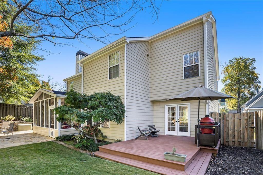 73 Whitlock Square Southwest Marietta, GA 30064 - Photo 27 of 35 a view of a house with backyard and sitting area