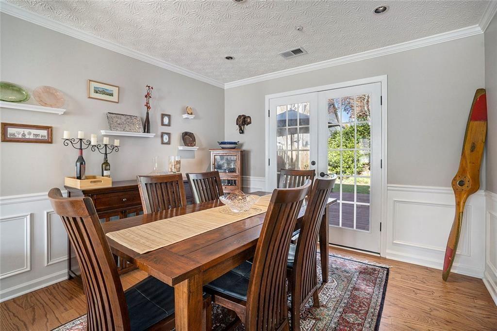 73 Whitlock Square Southwest Marietta, GA 30064 - Photo 4 of 35 a view of a dining room with furniture window and wooden floor