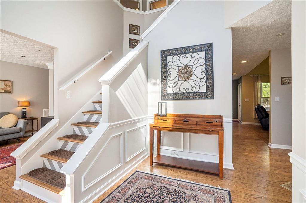 73 Whitlock Square Southwest Marietta, GA 30064 - Photo 7 of 35 a view of entryway and hall with wooden floor