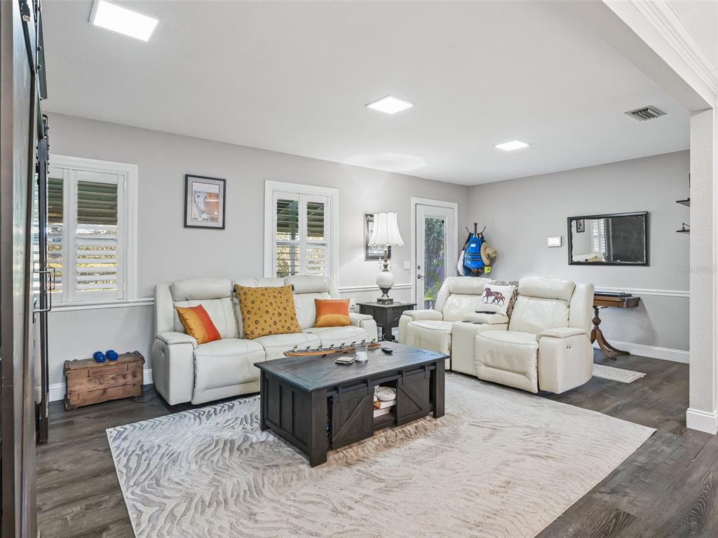 3505 Northeast 97th Street Road Anthony, FL 32617 - Photo 8 of 38 a living room with furniture and a couch