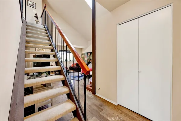 a view of entryway with wooden floor