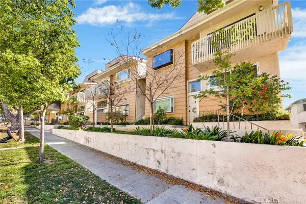 a view of a building with a street
