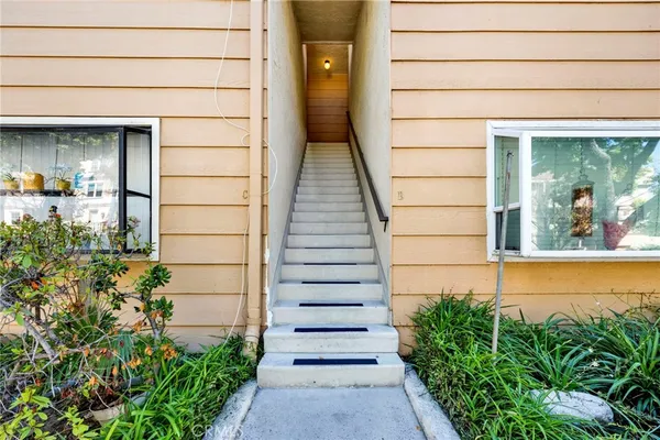 a view of a pathway besides a building