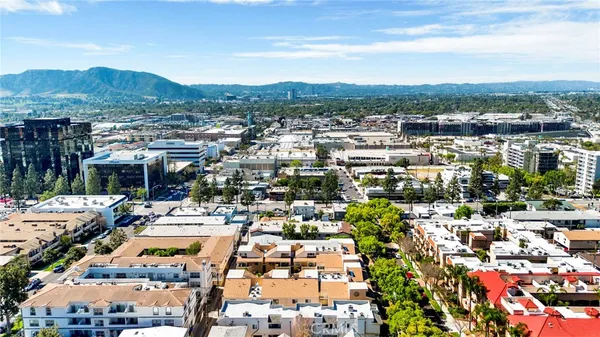 a picture of a bench in a white wall