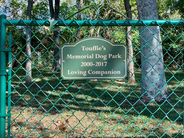 a sign on the side of a wall