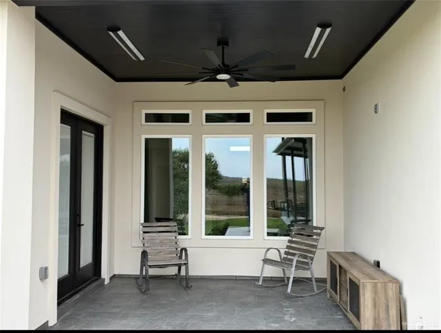 a building outdoor space with patio furniture