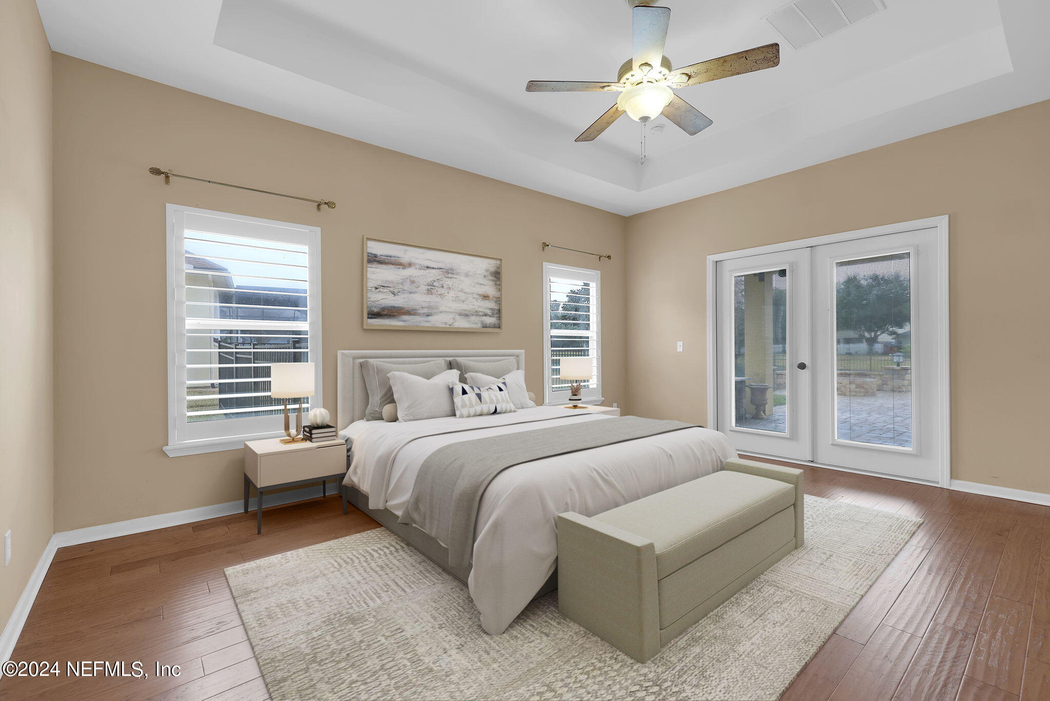 2044 River's Own Road St. Augustine, FL 32092 - Photo 7 of 48 a bedroom with a large bed chandelier and a window