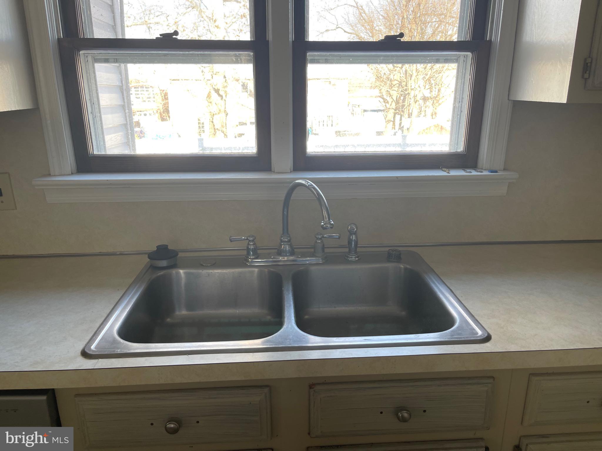322 McKinley Avenue Pitman, NJ 08071 - Photo 14 of 44 a close view of sink and tap
