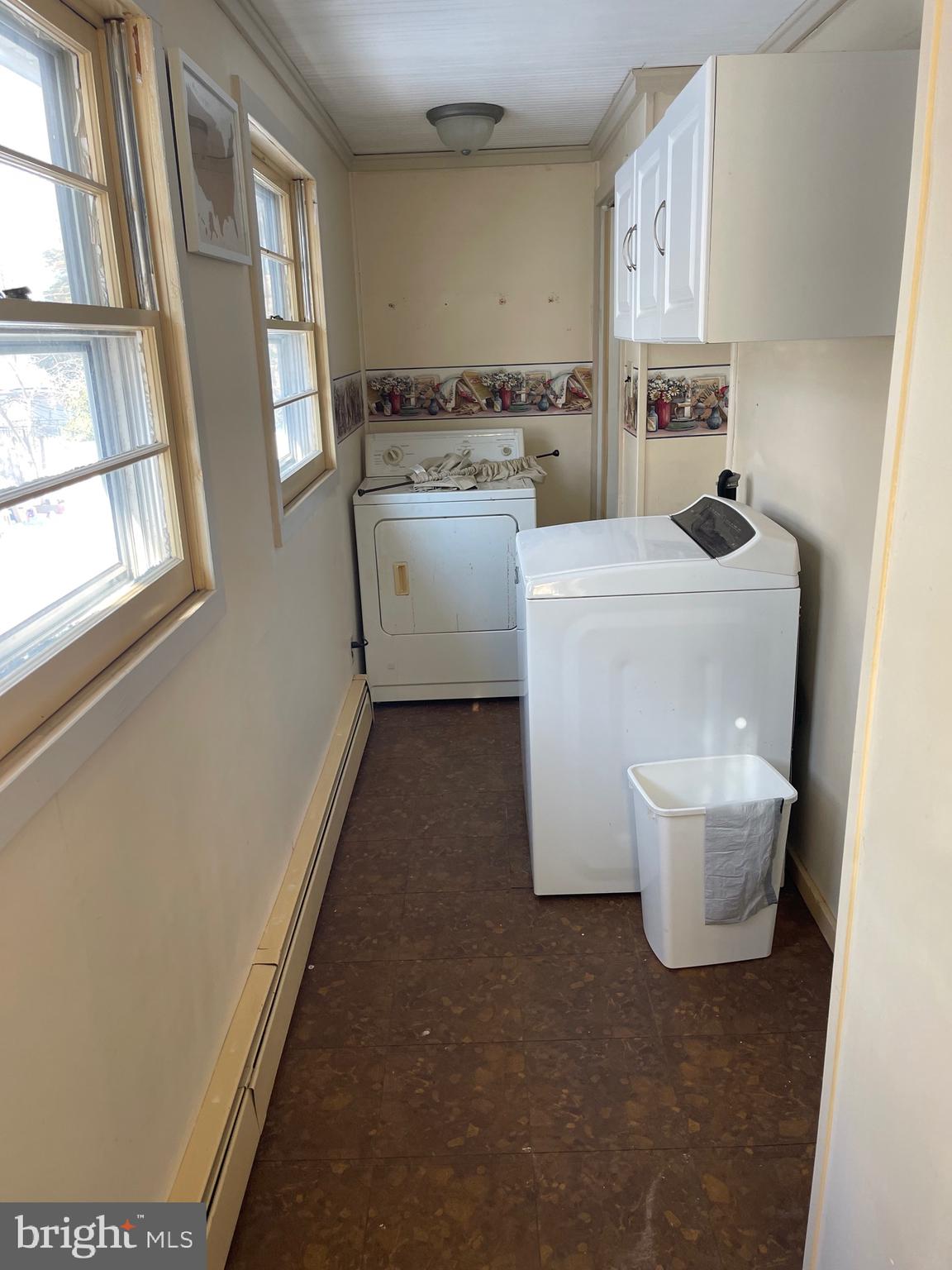 322 McKinley Avenue Pitman, NJ 08071 - Photo 16 of 44 a room with a white stove top oven and sink