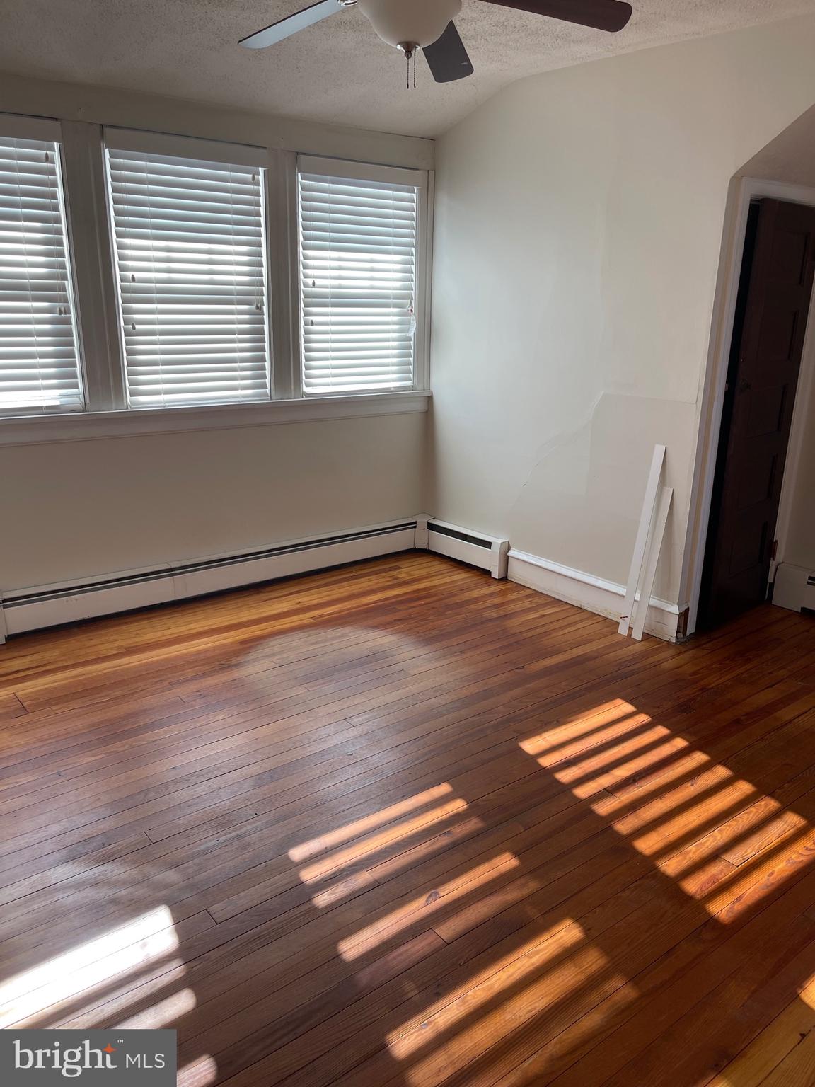 322 McKinley Avenue Pitman, NJ 08071 - Photo 22 of 44 a view of room with window and wooden floor