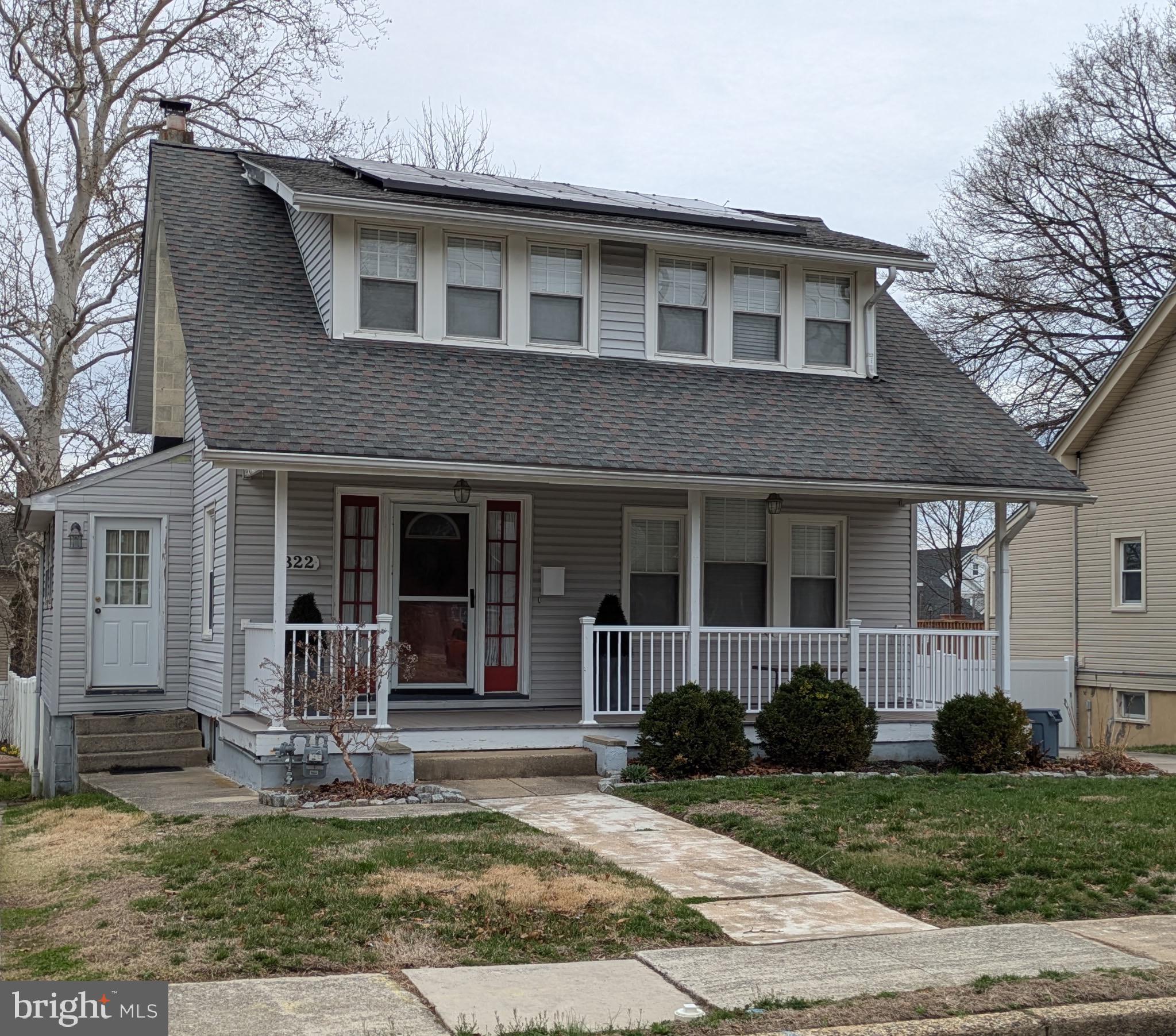 322 McKinley Avenue Pitman, NJ 08071 - Photo 3 of 44 a front view of a house with a yard