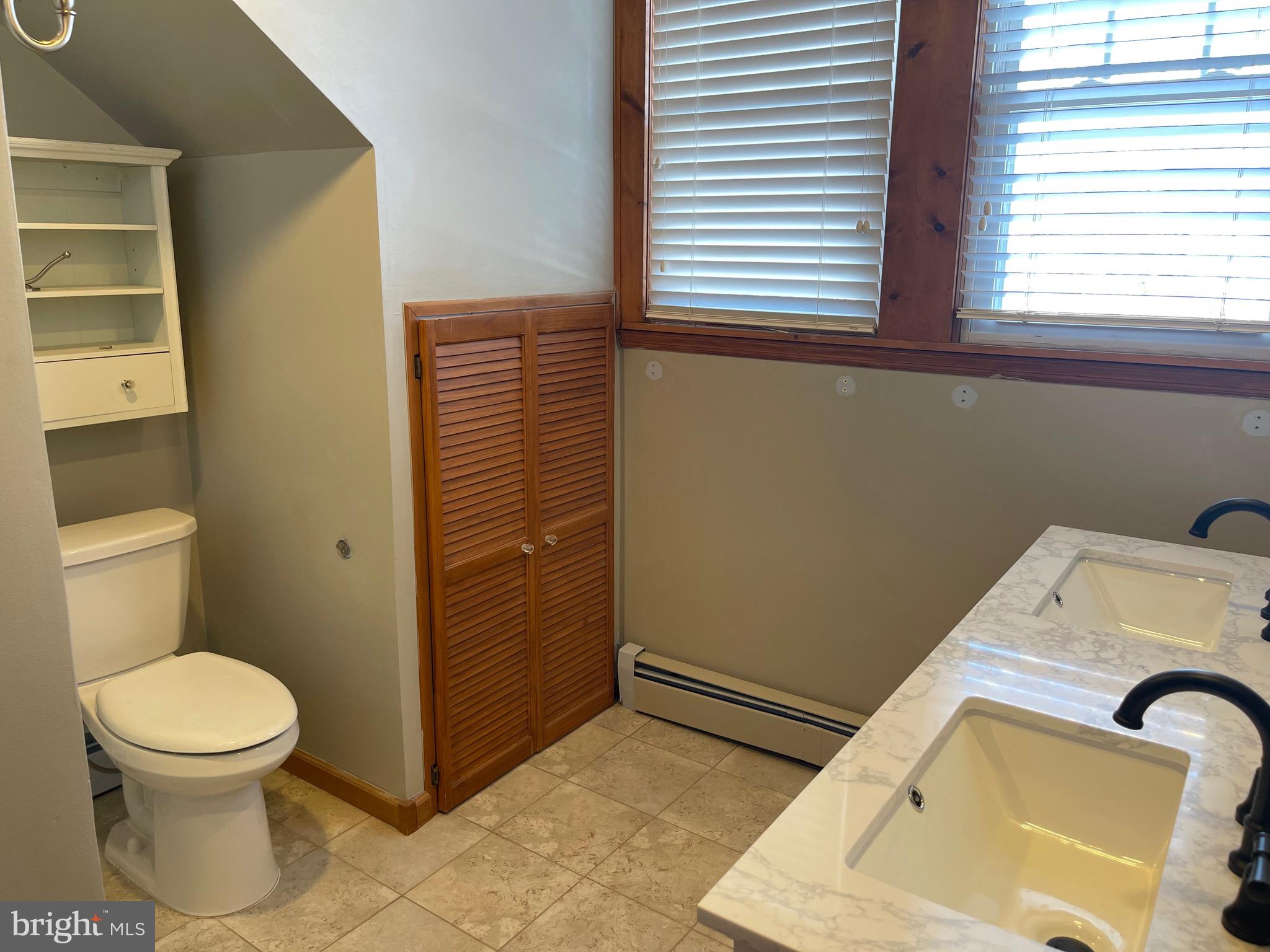 322 McKinley Avenue Pitman, NJ 08071 - Photo 33 of 44 a bathroom with a toilet and a sink