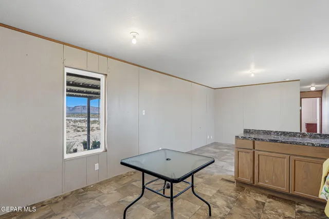 a room with furniture and window