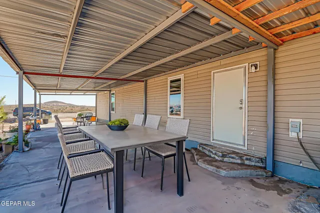 a view of a backyard of the house