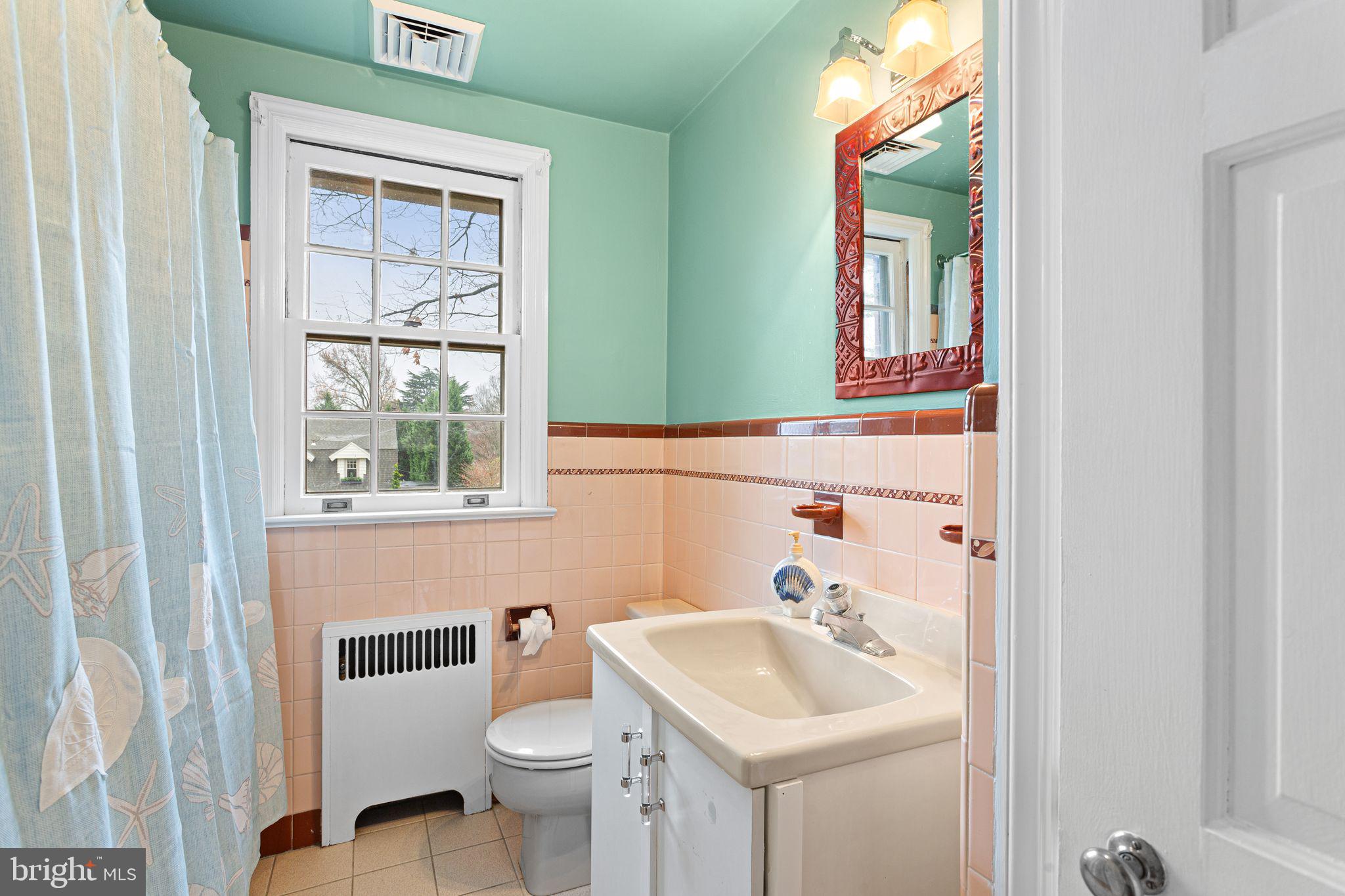 35 Colonial Ridge Drive Haddonfield, NJ 08033 - Photo 11 of 17 a bathroom with a sink toilet and mirror
