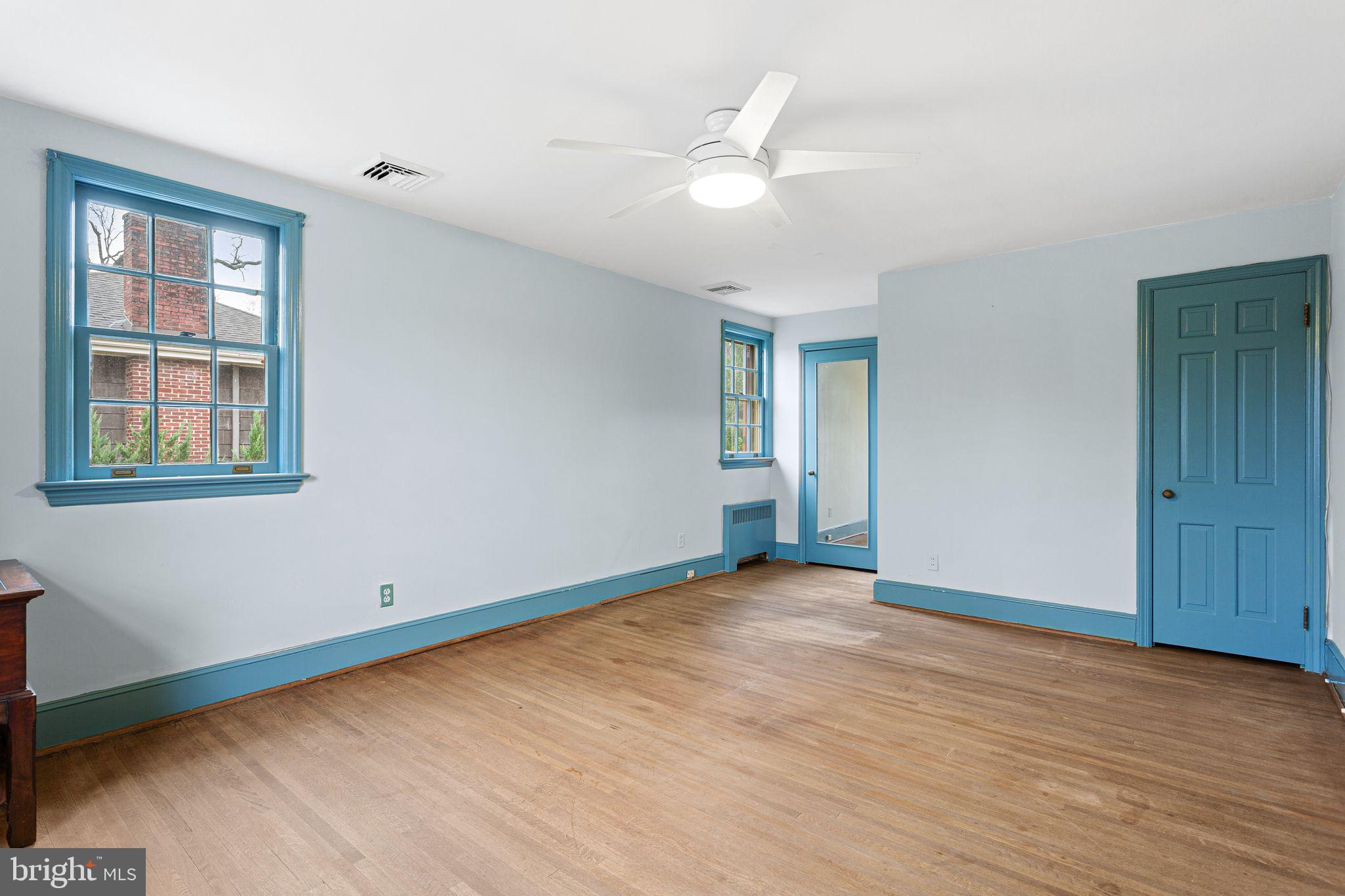 35 Colonial Ridge Drive Haddonfield, NJ 08033 - Photo 8 of 17 a view of an empty room with a window and wooden floor