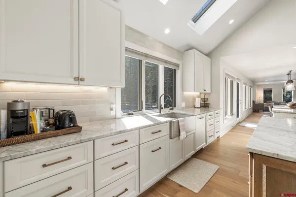 a large kitchen with cabinets