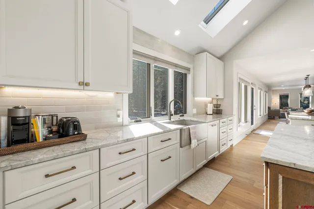 a large kitchen with cabinets