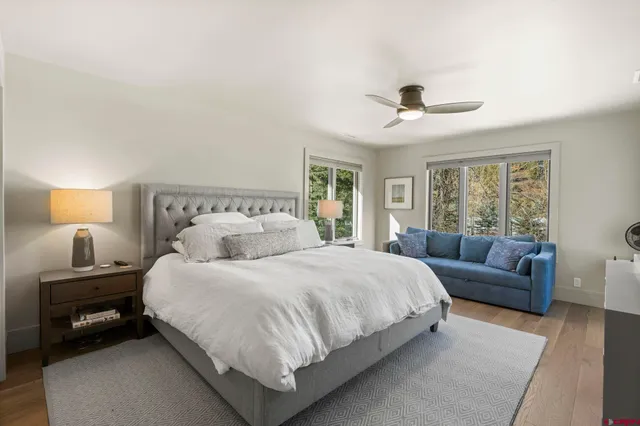 a bedroom with a bed and furniture