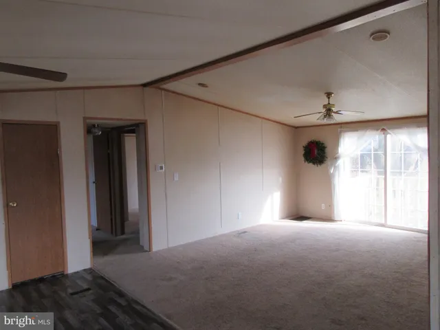 a view of empty room with windows