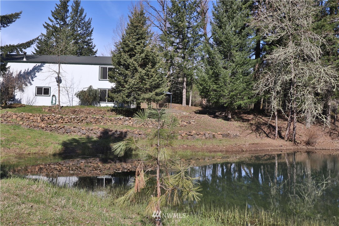 51 Quail Run Road Stevenson, WA 98648 - Photo 23 of 31 a view of a lake from a yard