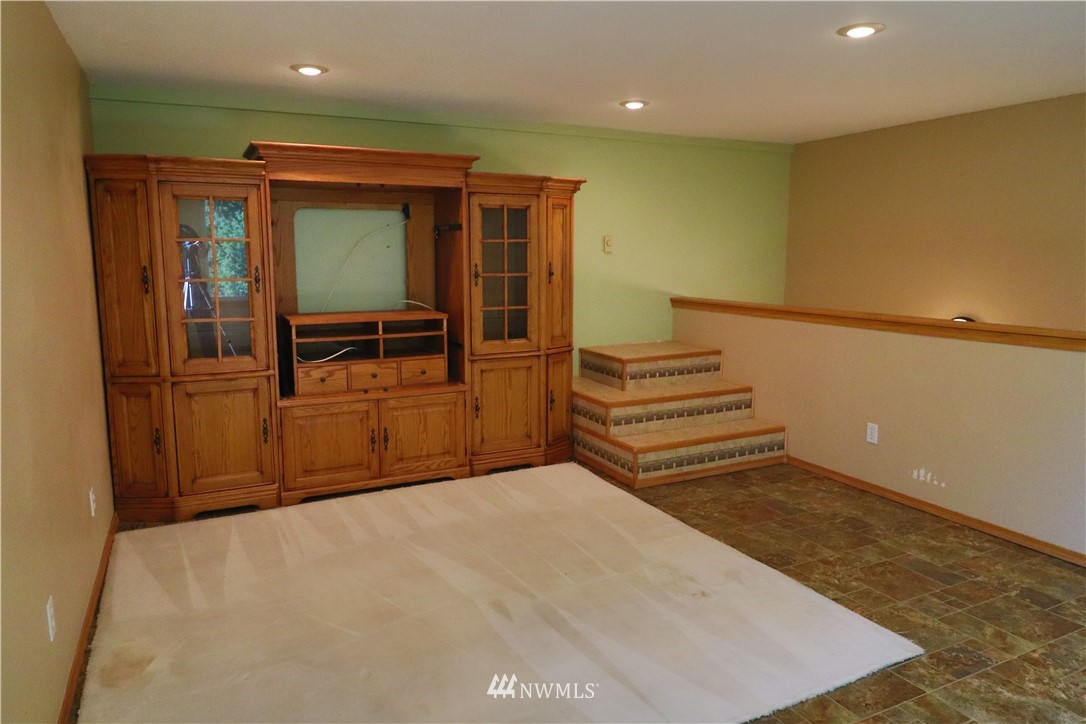 51 Quail Run Road Stevenson, WA 98648 - Photo 9 of 31 a view of an empty room with wooden floor