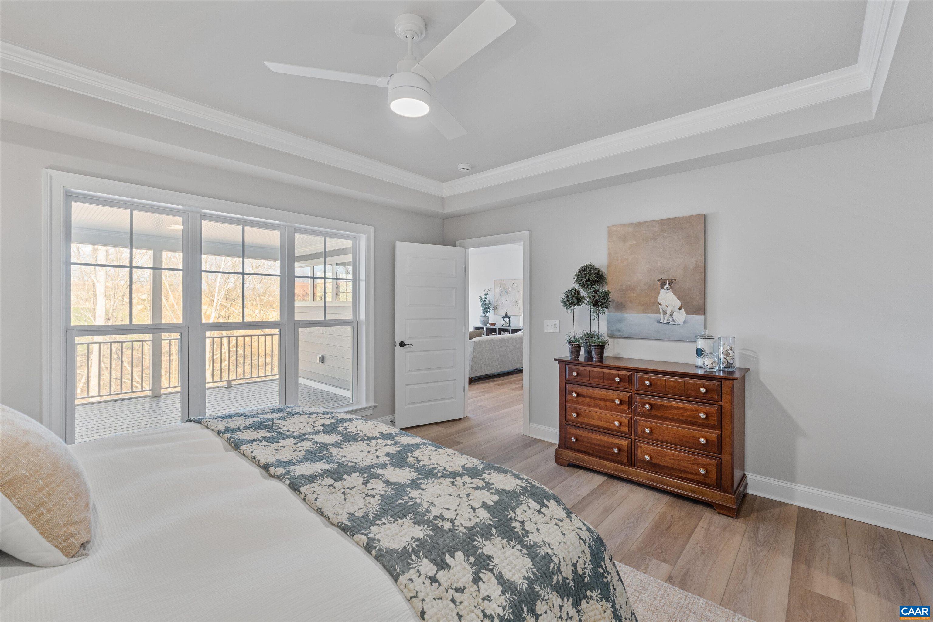 3809 Decerbo Terrace Charlottesville, VA 22901 - Photo 22 of 53 a bedroom with a bed and wooden floor