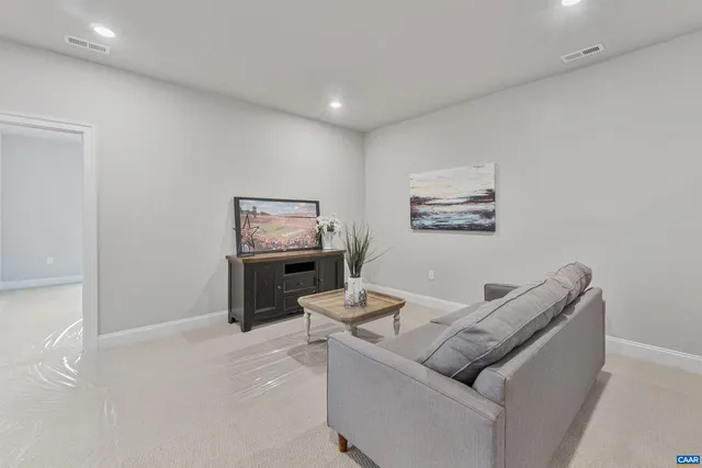 a bathroom with a sink toilet and mirror