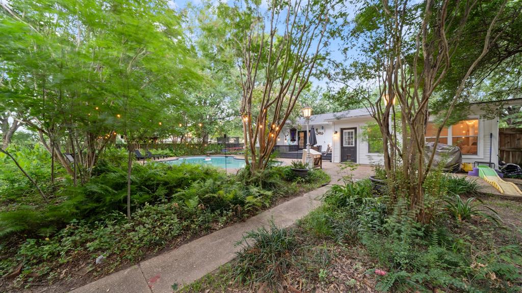 518 West Kansas Street Van, TX 75790 - Photo 23 of 24 a view of a house with backyard and sitting area
