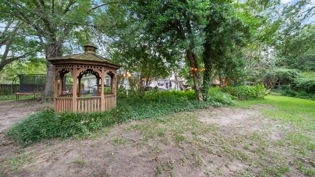 a view of a deck with a table and a chairs