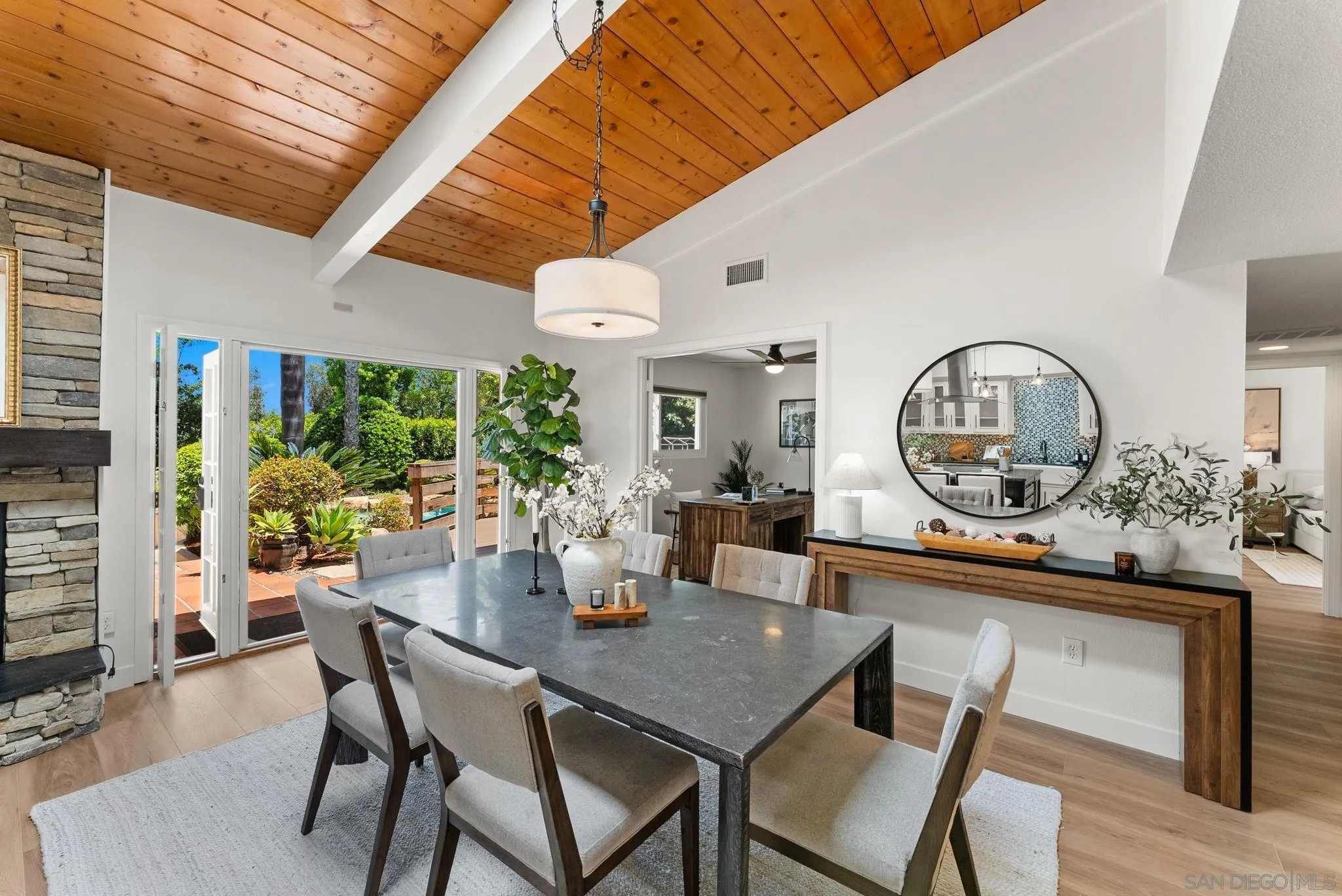 12832 Stone Canyon Road Poway, CA 92064 - Photo 15 of 60 a view of a dining room with furniture and window