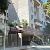 a view of a building with a street