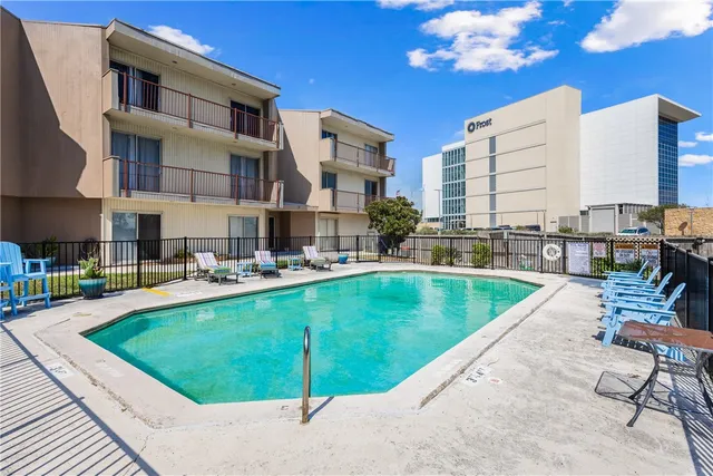 a view of a city with tall buildings