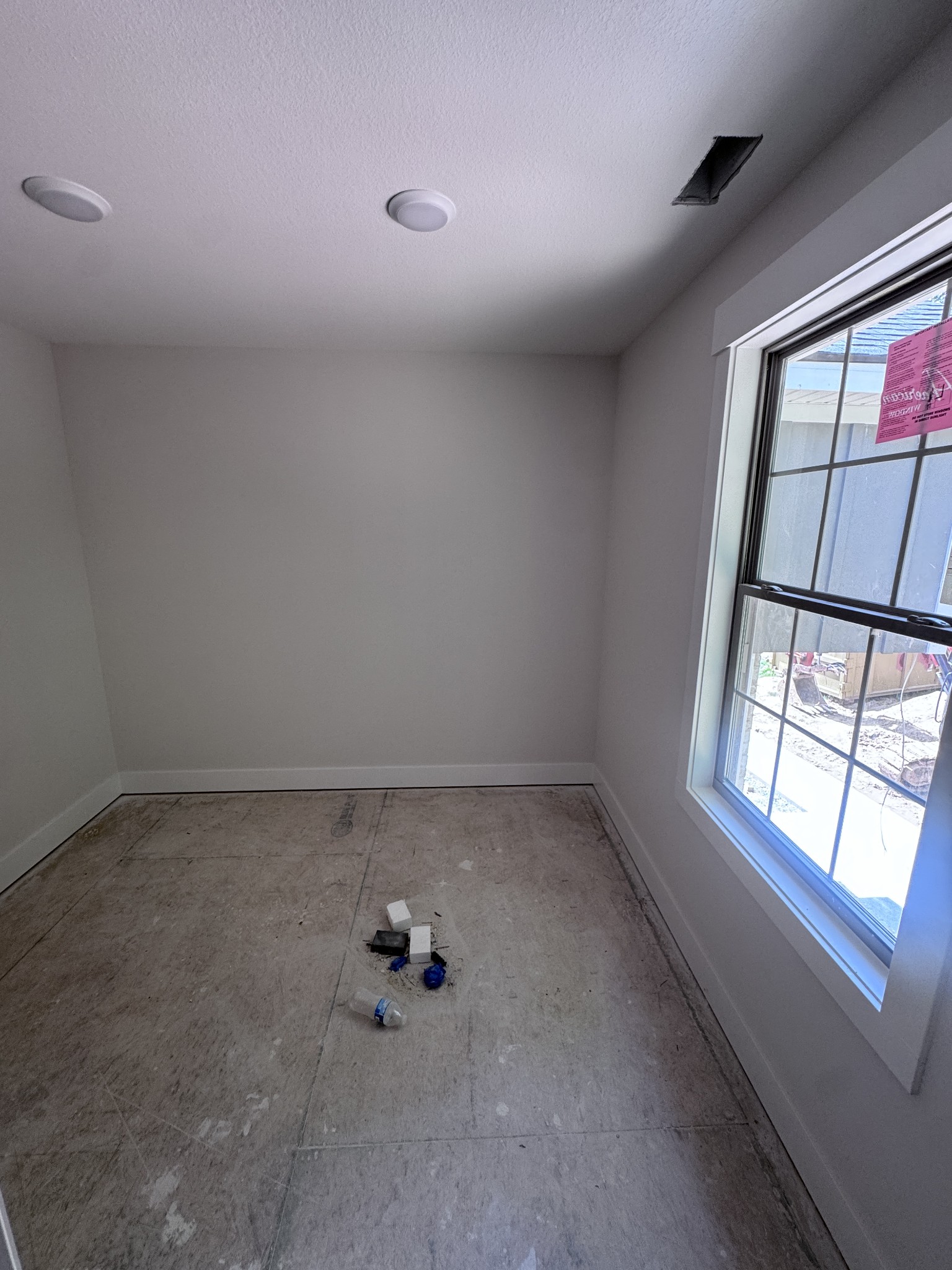 1830 McWhorter Road Cunningham, TN 37052 - Photo 39 of 46 an empty room with a window