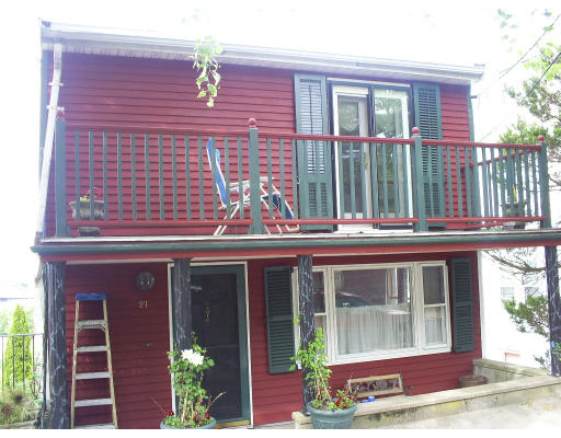 a front view of a house with a porch