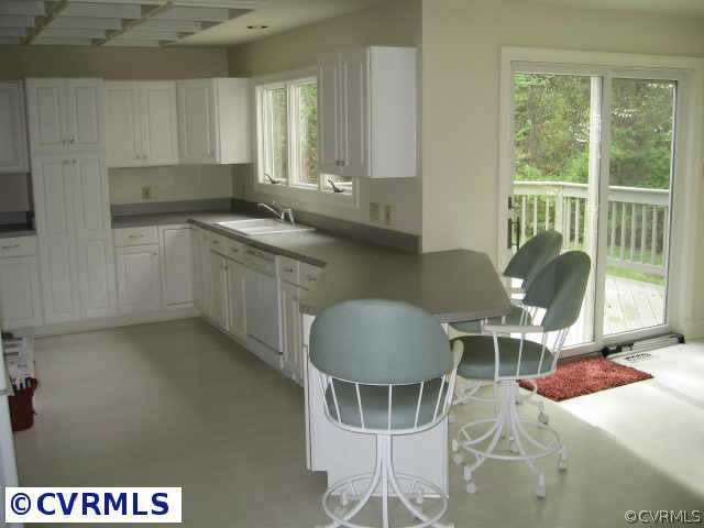3139 D Stony Point Road, Unit D Richmond, VA 23235 - Photo 7 of 10 Other - Kitchen Prep Area with white washed floor and soothing colors. Refrigerator, Microwave, Smooth top cooking included.