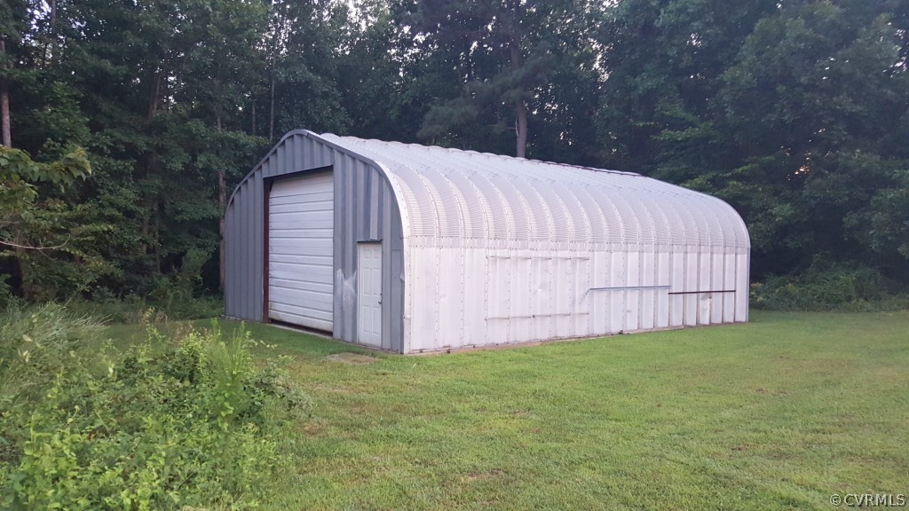22205 Barnes Road Dinwiddie, VA 23841 - Photo 16 of 19 Wow look at this 30x40 3+car Garage with concrete