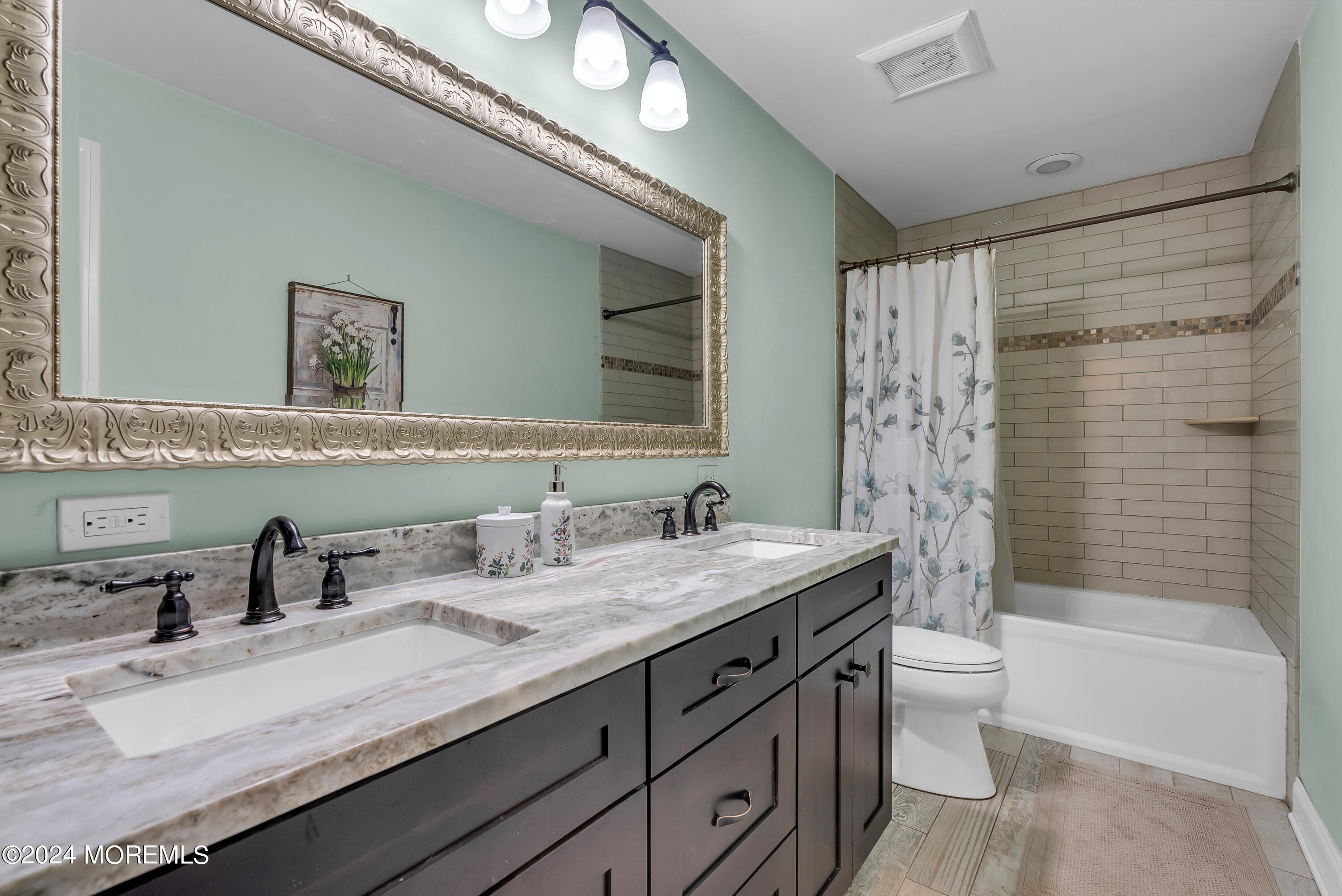 877 Hyson Road Jackson, NJ 08527 - Photo 11 of 35 a bathroom with a granite countertop bathtub sink vanity mirror and toilet