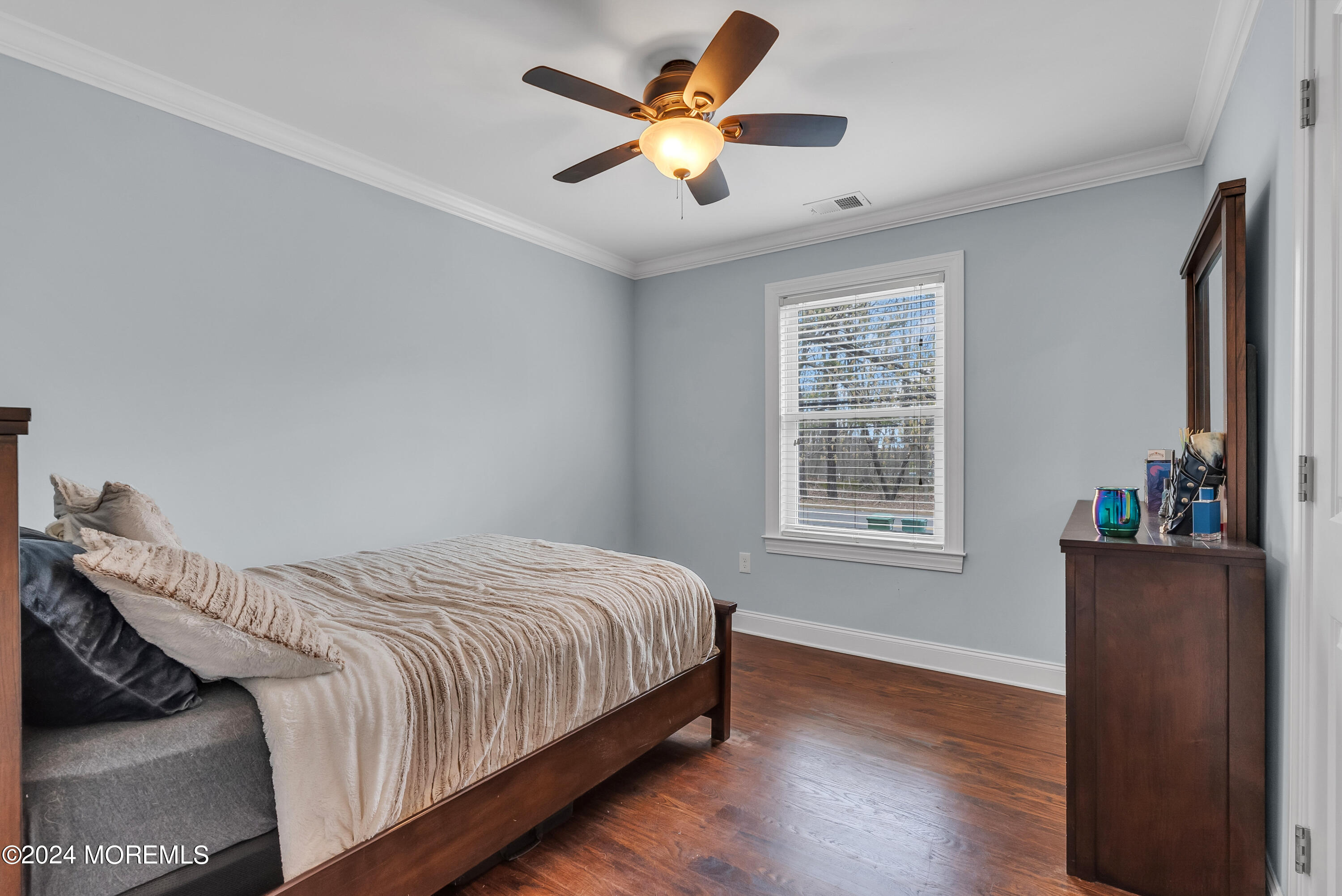 877 Hyson Road Jackson, NJ 08527 - Photo 14 of 35 a bedroom with bed and a window